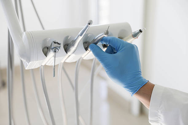 Professional Tooth Extraction technician working in Gaston County County, NC